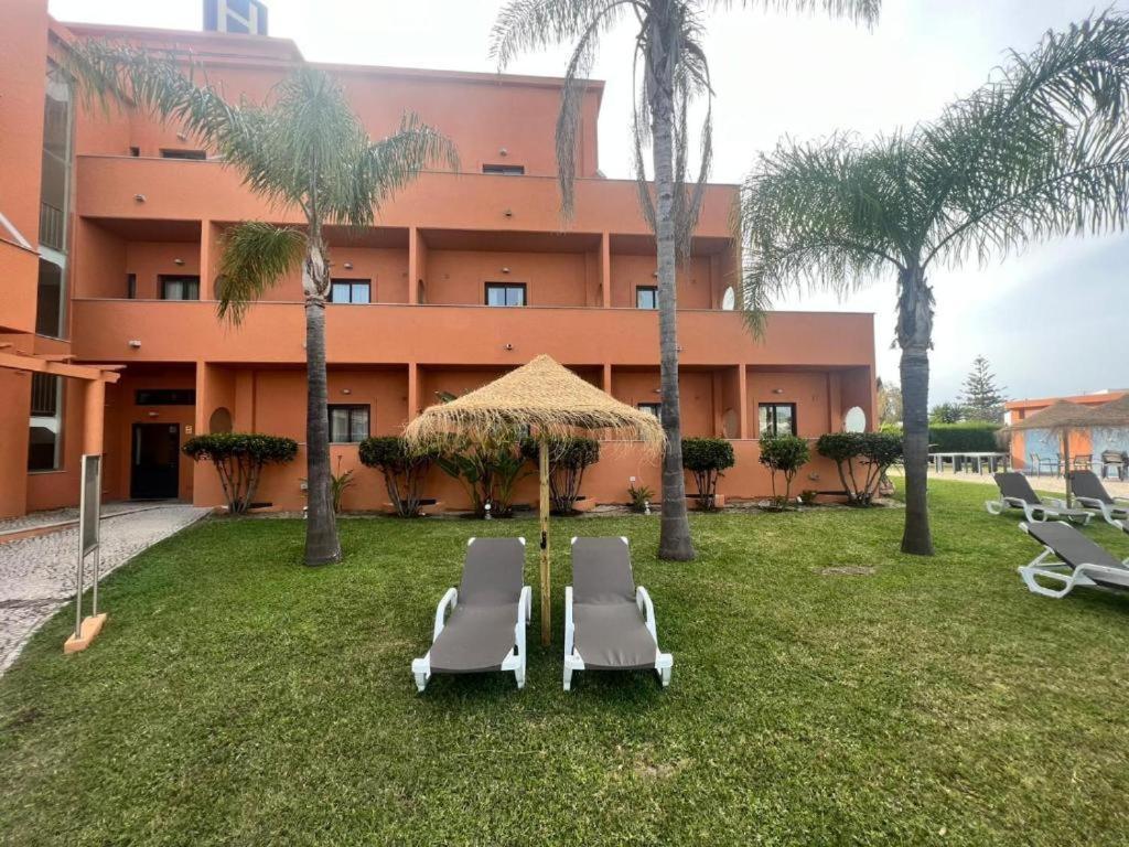 Hotel Praia Sol Quarteira Bagian luar foto